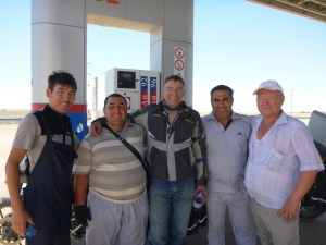 Outside Baikanur, they each wanted our photo so Anne took one too - the one 2nd from the left gave us a watermelon which we couldn't refuse!!!