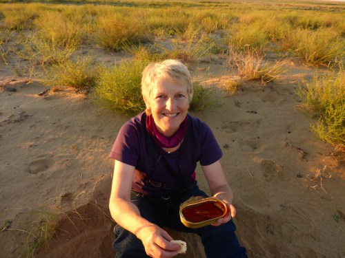 Anne very happy, enjoying the surroundings and delicious sardines for dinner - what more could a girl want?!
