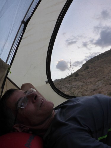 Enjoying watching the night fall from the safety and comfort of our tent, outside Dor Badam, Iran