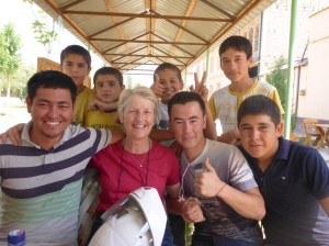 Our Uzbek friends after our amazing lunch stop in Uchqorghan - Abduvohid on my right and Mohamid on my left
