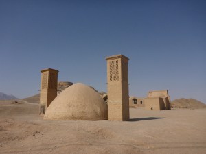 Wind towers above a water reservoir near the Towers of Silence, Yazd, Iran