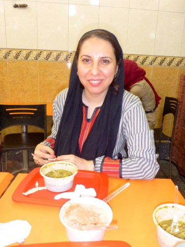 Saba introducing us to osh at Tajrish square, Tehran, Iran