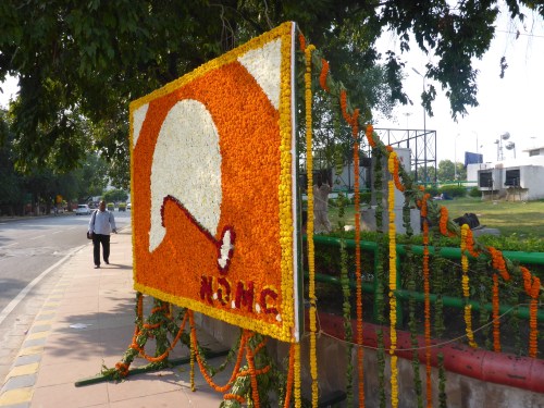 Flower tributes to Mahatma Ghandi on his birthday, found at most roundabouts in Delhi
