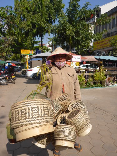 Rice basket seller in Vientiane, Laos