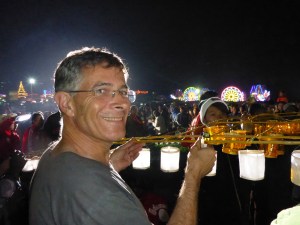Anthony has been promoted by the red team and given lighting candle and lighter at the Taunggyi fire balloon festival, Myanmar