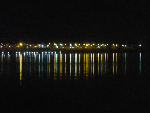 Lights of Thailand seen across the Mekong from Vientiane, Laos