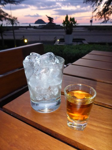 Anne's first scotch in months, Pak Meng beach, Thailand