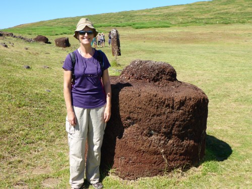 Anne next to a pukao or topknot.  The column in the background was a feminine statue with 2 heads, used as a funerary pillar