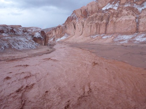 Crossing the flash flood to backtrack up the hill