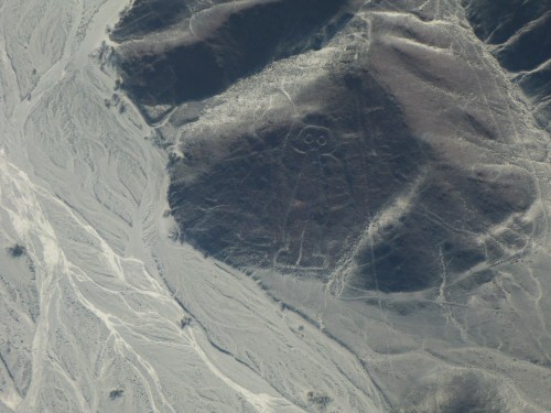 The Austronaut geoglyph on the hillside rather than the valley floor.