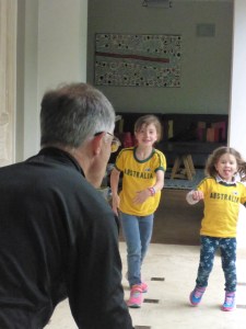 Gloria and Isabel playing ball with Anthony - not sure who is having the most fun