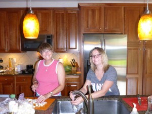 Karen and Kristi preparing the okra for the bbq