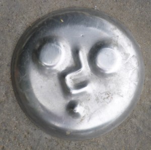 What are those cute smileys on the pavement in Sevilla?