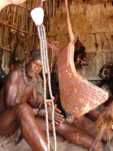 Himba woman's ornament made of leather, shells and even found bullets